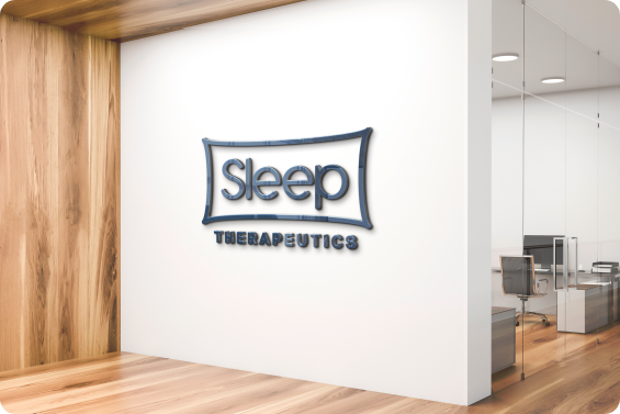 Sleep Therapeutics logo in the office on a white wall